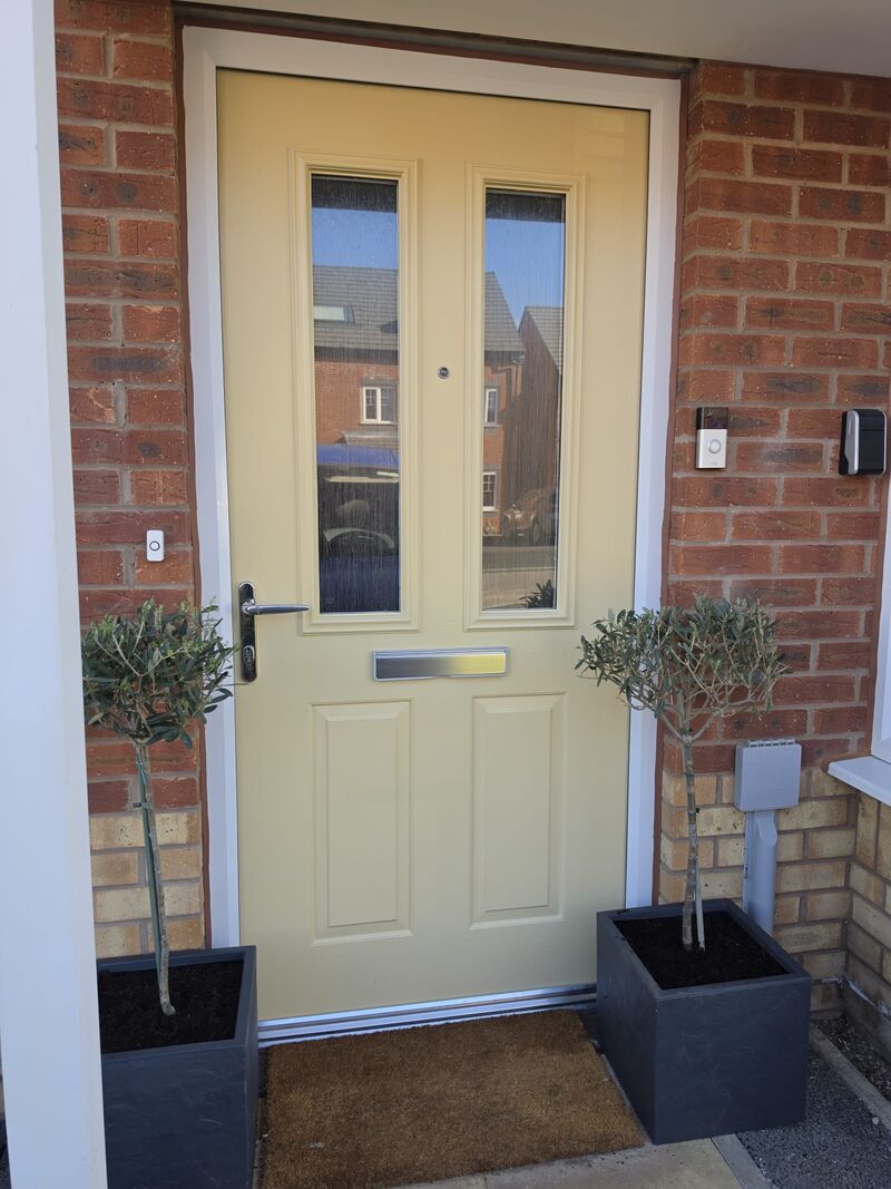 After: sage green composite door