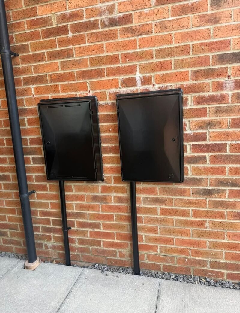After: Meter Boxes & Pipes — Gloss Black